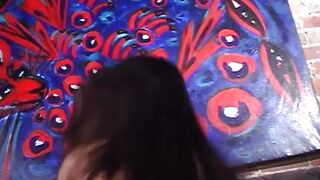 Chic lady enjoys mature man′s touch in front of crowd