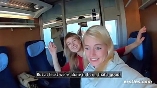 Two women tangled in passion on the street