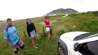 Couple Engages in Explicit Swap by the Ocean